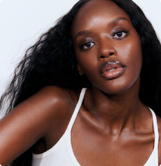 Model with glazed, hydrated skin