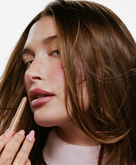 hailey wears peptide lip shape in press